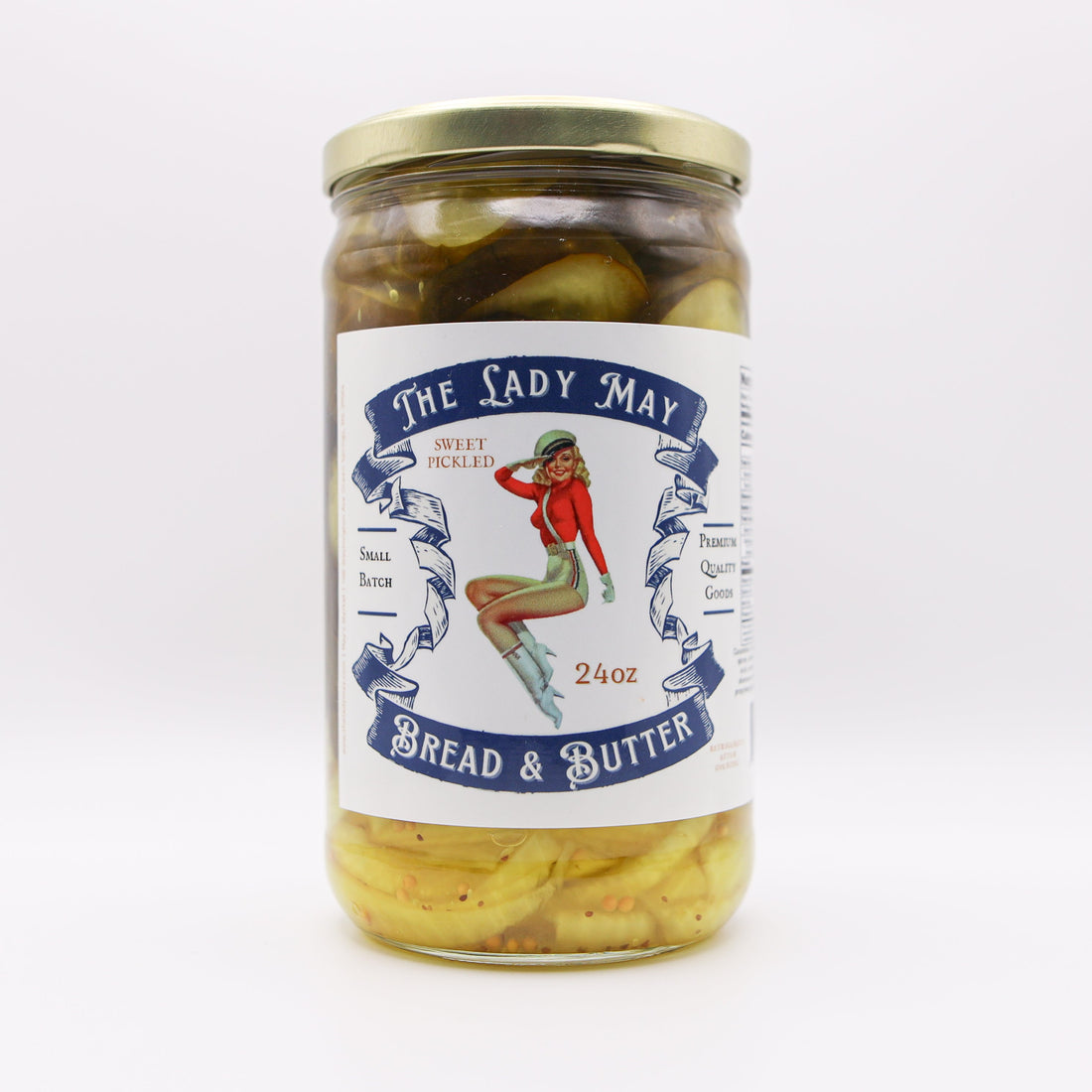 A 24oz jar of The Lady May Bread &amp; Butter Sweet Pickle Slices with a label featuring a pickle-themed illustration and product information.