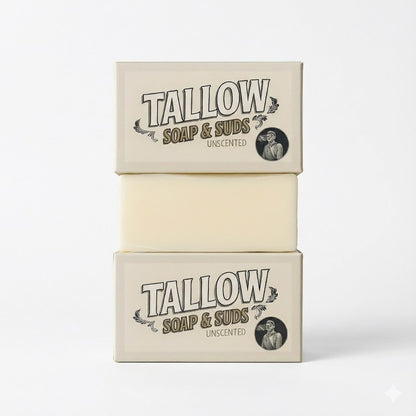 Two bars of Tallow Soap &amp; Suds soap stacked on a white background
